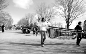 people walking in a parade