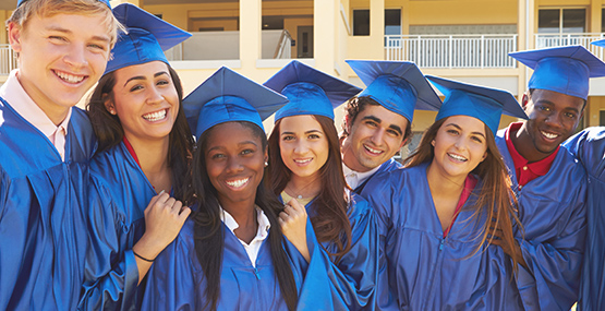 smiling high school graduates