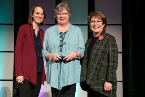 Lois Stinogel, Distrrict C Volunteer of the Year, with LeadingAge Minnesota leadership.