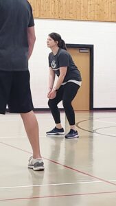 A volleyball player poised to hit the ball